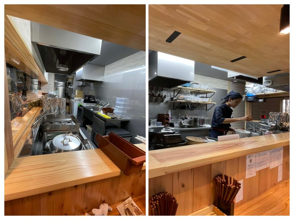 清潔感のある「貝麺ふか川」のカウンター席と木目調の店内